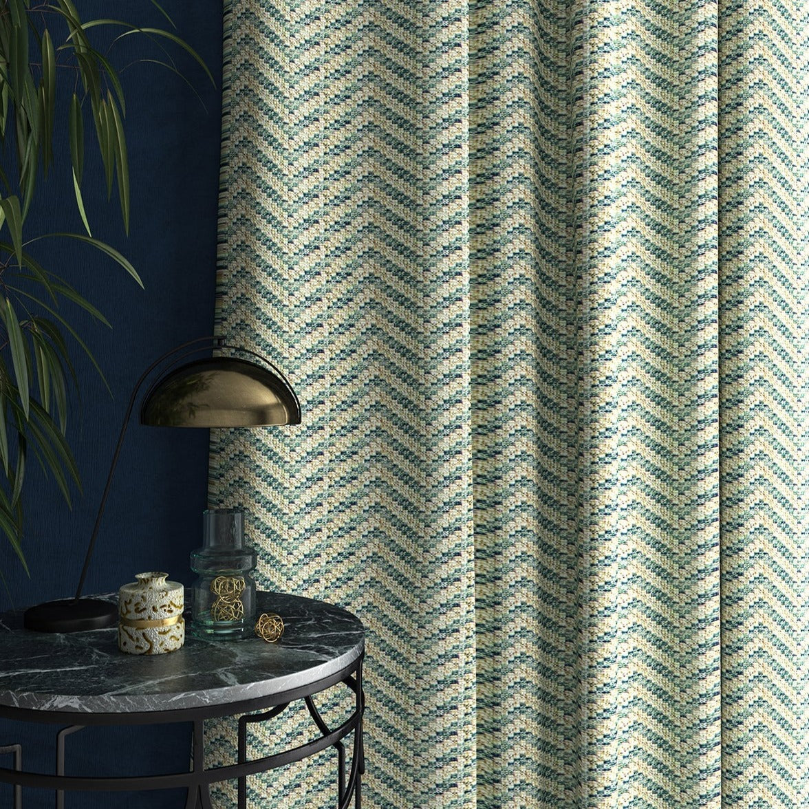 Curtain in a light blue herringbone weave fabric