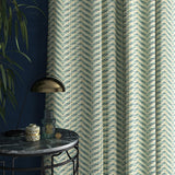 Curtain in a light blue herringbone weave fabric