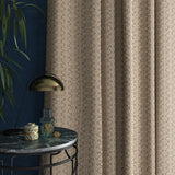 Curtains in a grey and white geometric weave fabric