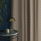Curtains in a monochrome geometric weave fabric