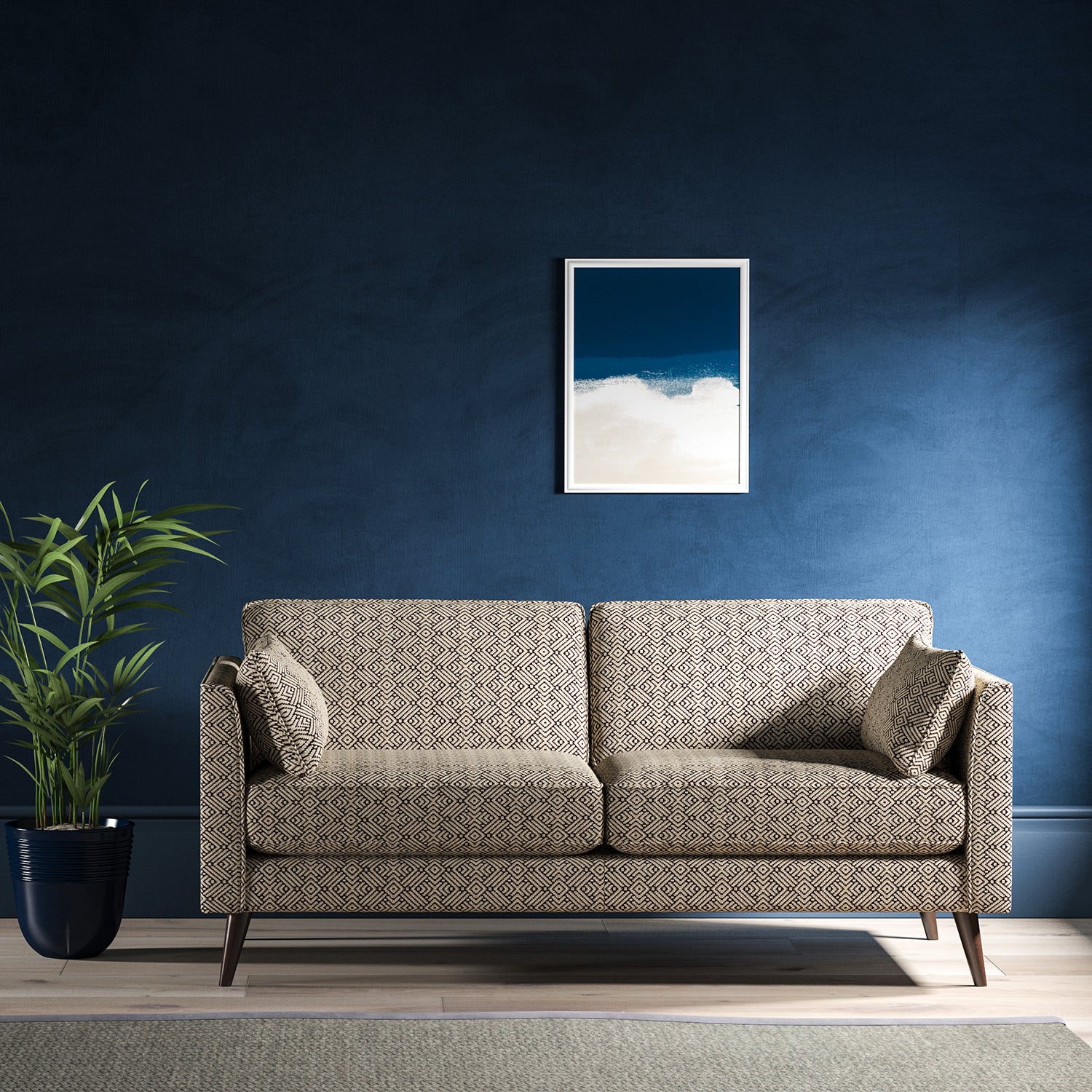 Sofa upholstered in a monochrome geometric weave upholstery fabric