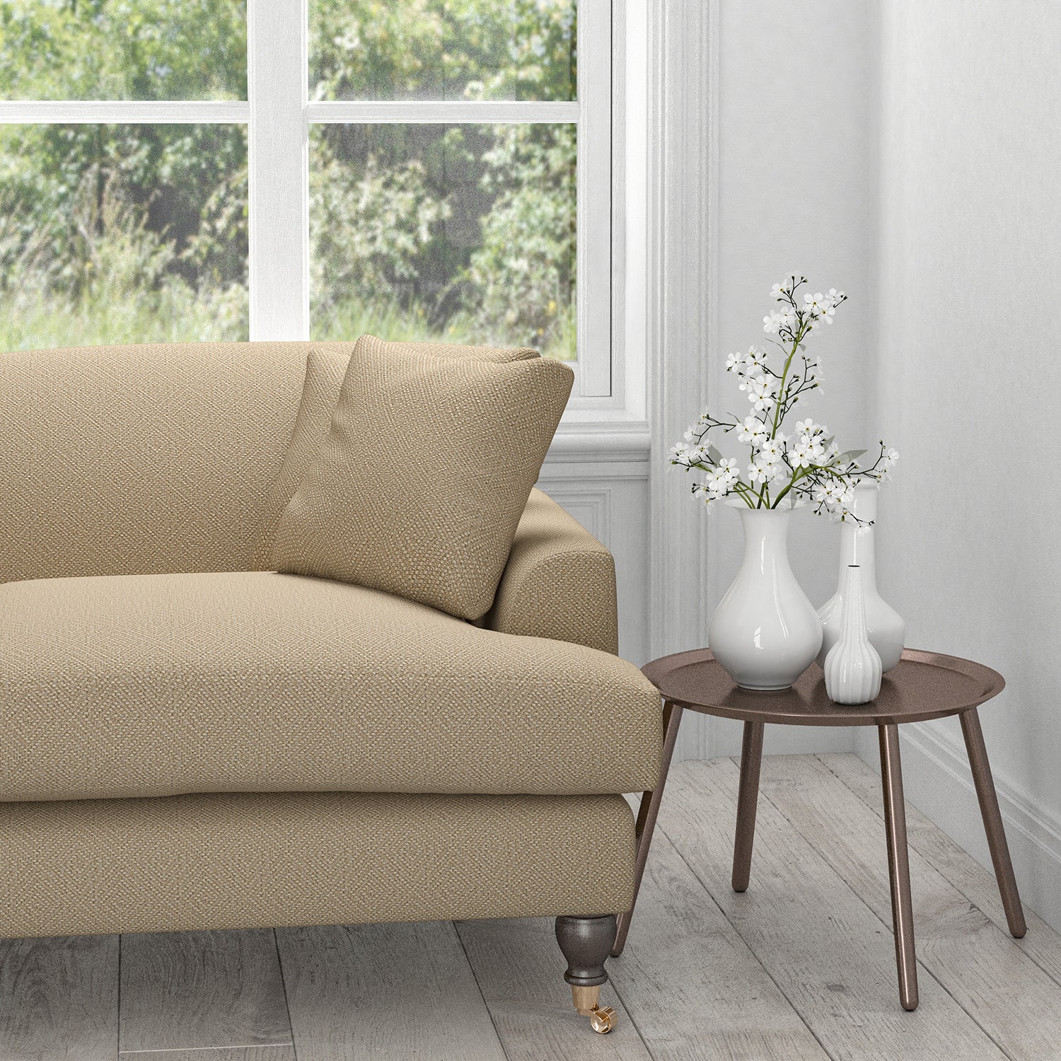 Sofa in a neutral fabric with a light neutral geometric woven design