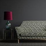 Sofa upholstered in a black and white geometric print