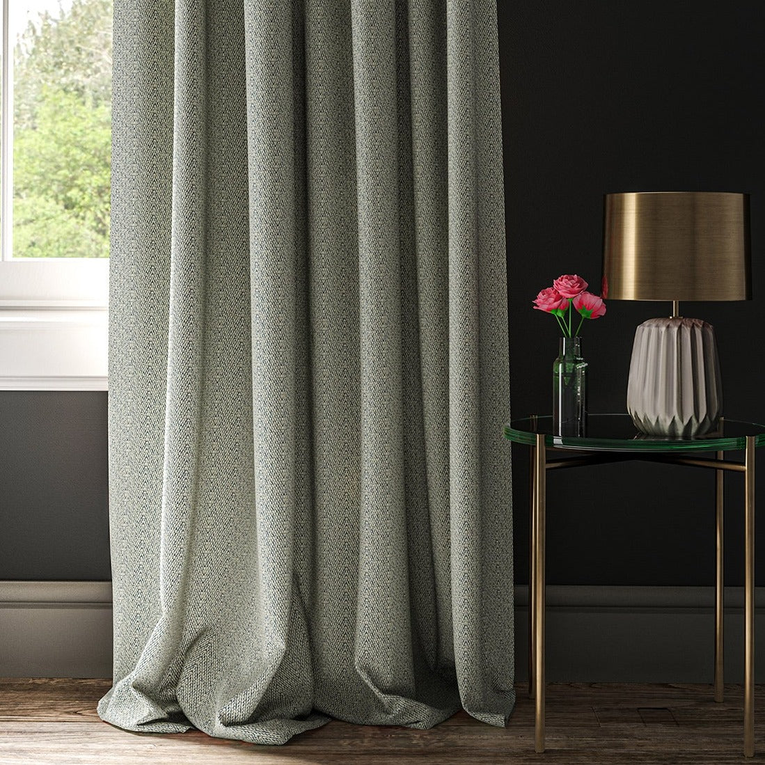 Curtain in a blue and white geometric weave fabric.