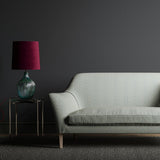 Sofa in a blue and white geometric weave fabric.