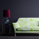 Linen sofa with a white and green oriental fan design