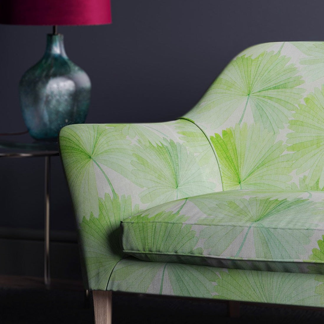 Linen sofa with a white and green oriental fan design