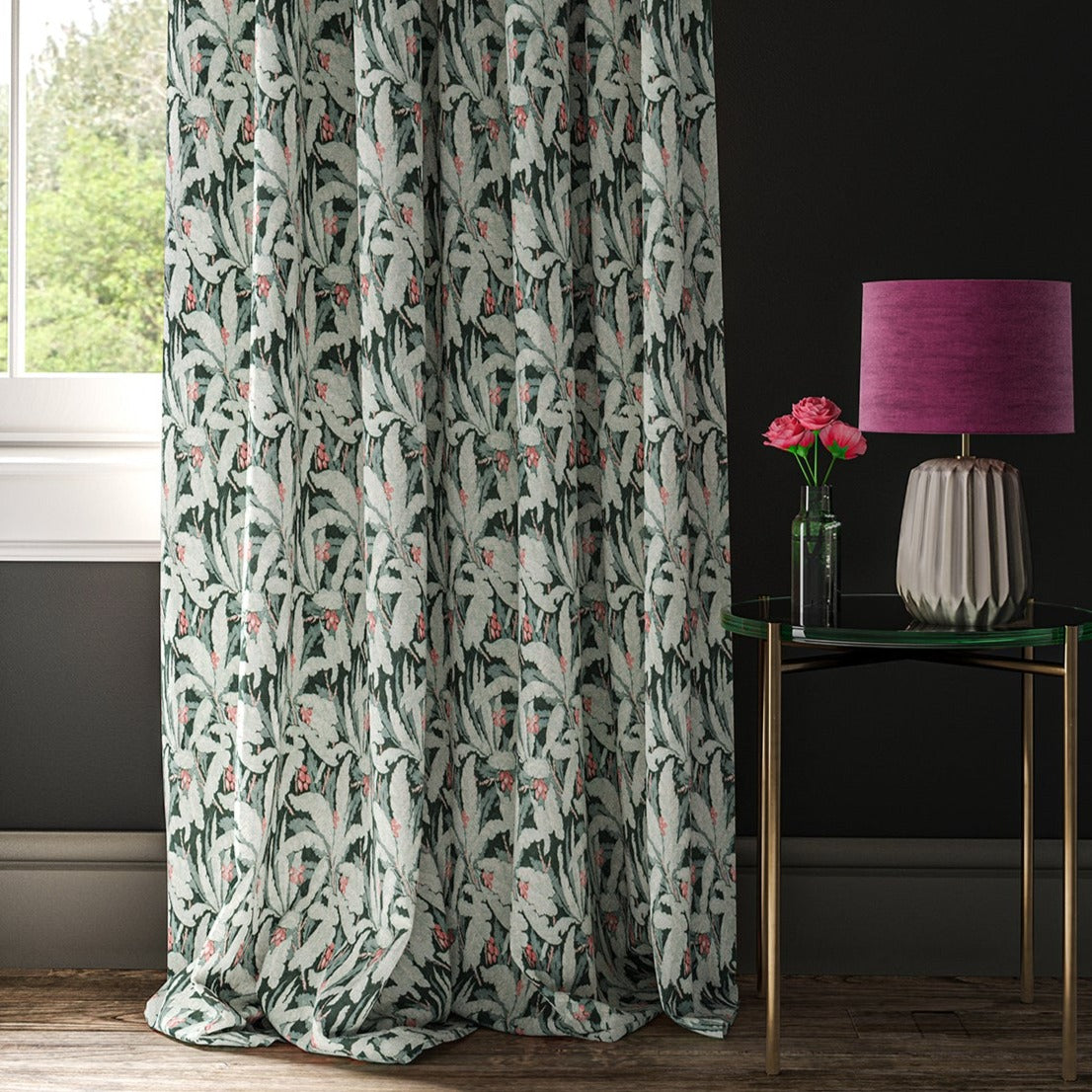 Curtain with a blue tropical leaf print fabric