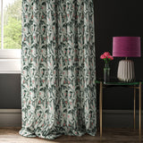 Curtain with a blue tropical leaf print fabric