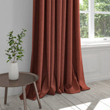 Curtain in a berry coloured plain cotton fabric