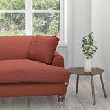 Sofa in a berry coloured plain cotton upholstery fabric