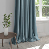 Curtain in a plain powder blue cotton fabric