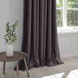 Curtain in a plain dark petrol blue cotton fabric
