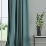 Curtain in a plain fabric, colour Aegean.