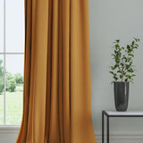 Curtain in a plain fabric, colour Marmalade.