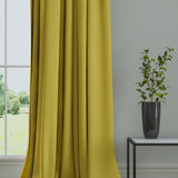 Curtain in a plain fabric, colour Citrus.