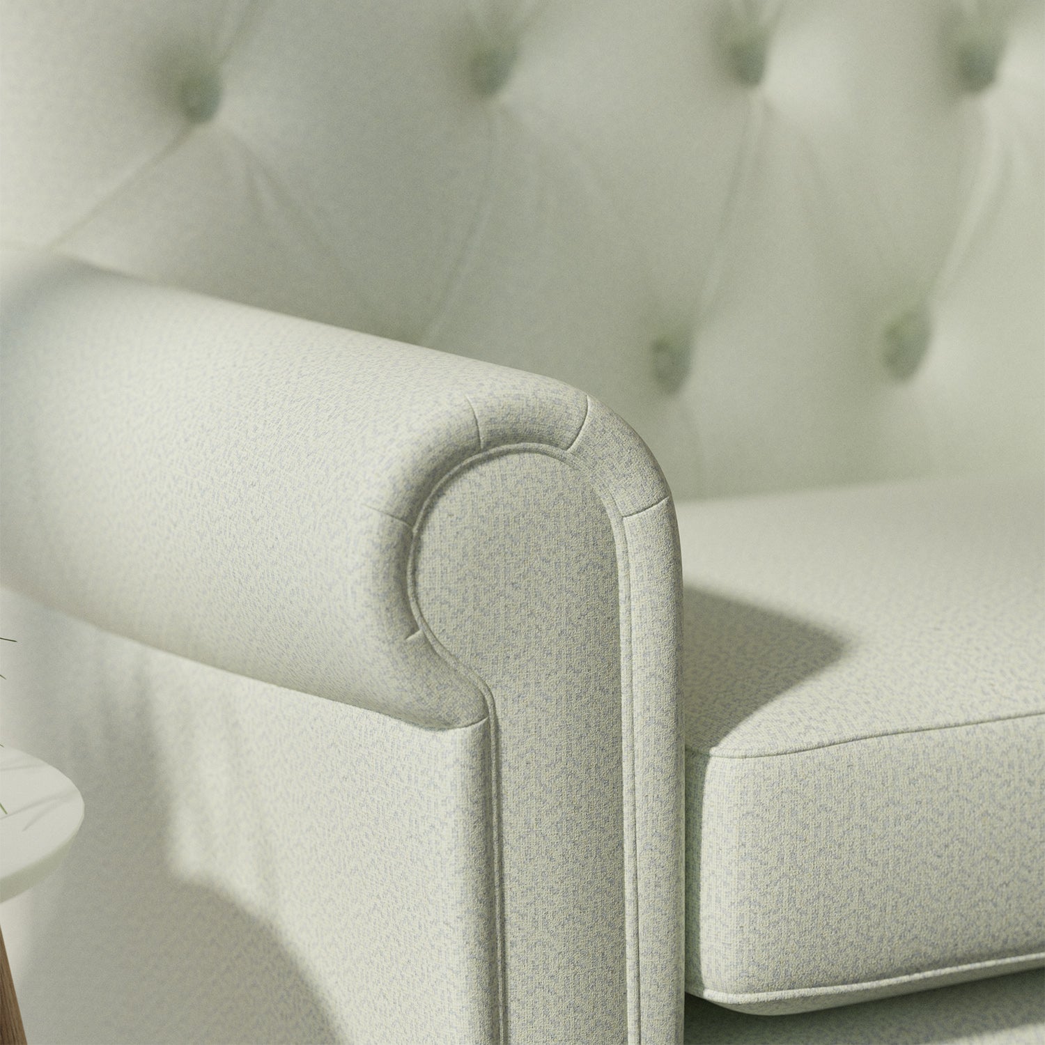 Sofa upholstered in a light blue Scandi-style semi-plain upholstery fabric with a stain resistant finish