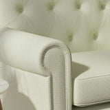 Sofa upholstered in a green Scandi-style semi-plain upholstery fabric with a stain resistant finish