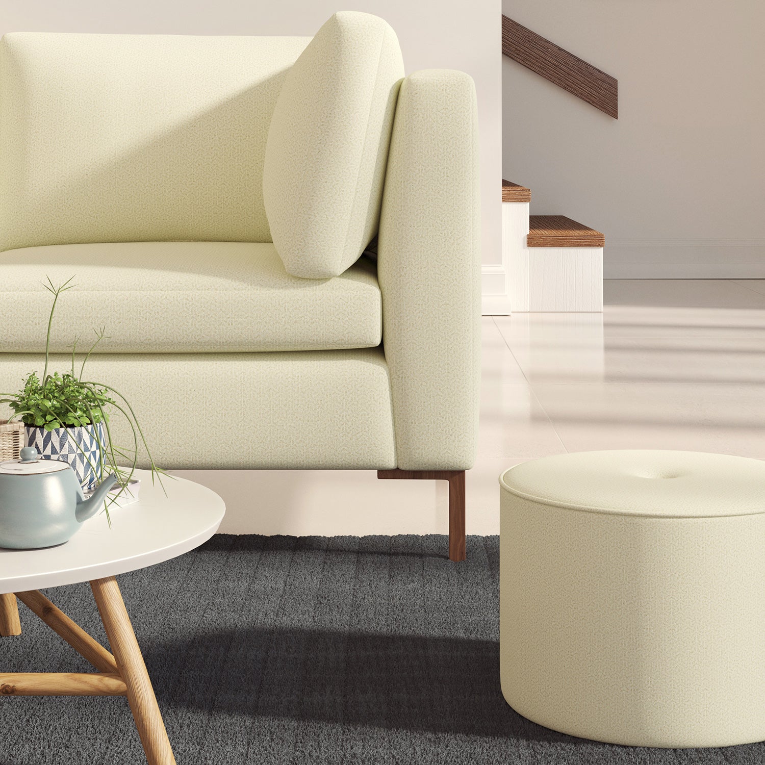 Sofa upholstered in a neutral Scandi-style semi-plain upholstery fabric with a stain resistant finish