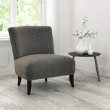 Chair upholstered in a stain resistant geometric velvet fabric