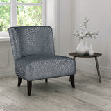 Chair upholstered in a blue stain resistant animal print upholstery fabric