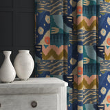Velvet curtain in a blue velvet fabric with abstract geometric design