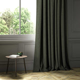A green woven fabric shown as a curtain.