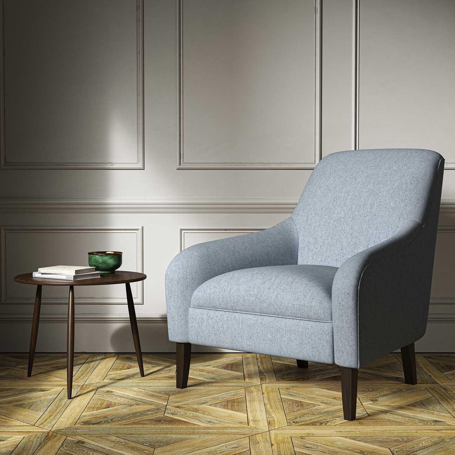 A blue woven fabric on an armchair.