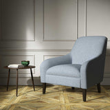 A blue woven fabric on an armchair.