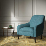 A blue woven fabric on an armchair.
