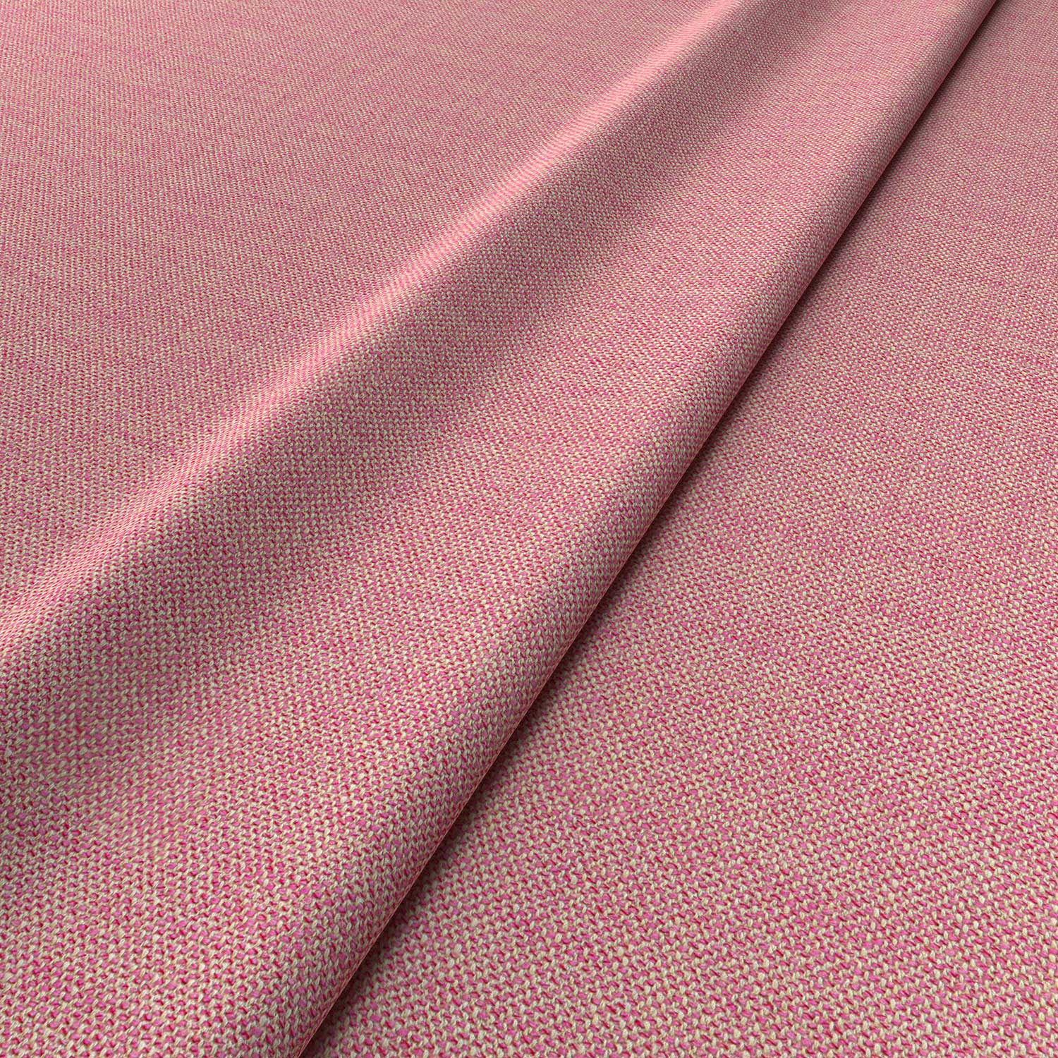 Fabric swatch of a plain pink weave fabric for upholstery
