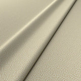 Fabric swatch of a cream woven fabric for upholstery