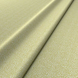 Fabric swatch of a green woven fabric for upholstery