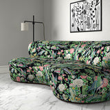 Velvet sofa upholstered in a printed velvet fabric with bamboo and oriental flowers, in multicolours.