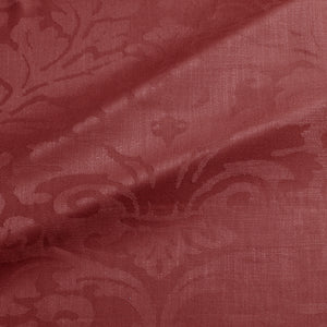 Fabric swatch of a contemporary damask fabric in a burgundy colour for upholstery and curtains.