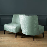 Armchairs in a contemporary damask fabric with light blue colours.