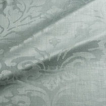 Fabric swatch of a contemporary damask fabric in a light blue colour for upholstery and curtains.