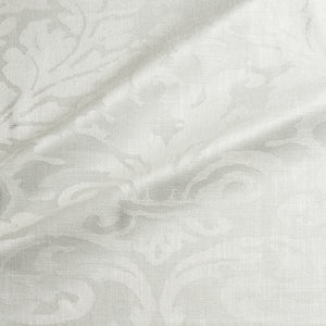 Fabric swatch of a contemporary damask fabric in a light neutral colour for upholstery and curtains.