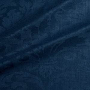 Fabric swatch of a contemporary damask fabric in a dark blue colour for upholstery and curtains.