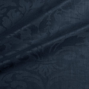 Fabric swatch of a contemporary damask fabric in a dark blue colour for upholstery and curtains.