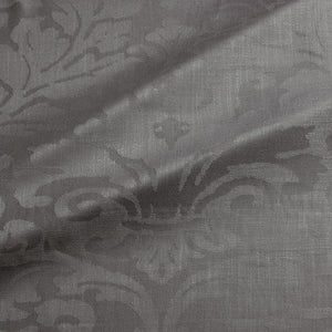 Fabric swatch of a contemporary damask fabric in a dark grey colour for upholstery and curtains.