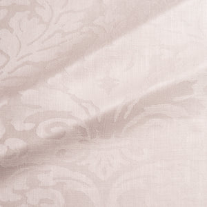 Fabric swatch of a contemporary damask fabric in a light pink colour for upholstery and curtains.