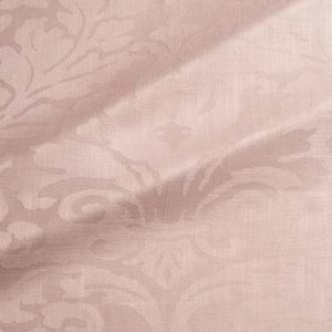 Fabric swatch of a contemporary damask fabric in a dusky pink colour for upholstery and curtains.