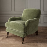 Green eco velvet upholstery fabric on an armchair