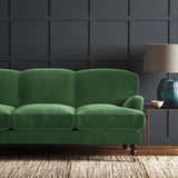 Green eco velvet upholstery fabric on a sofa