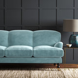 Blue eco velvet upholstery fabric on a sofa