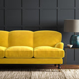 Yellow eco velvet upholstery fabric on a sofa