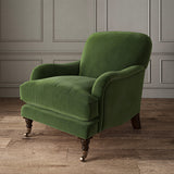 Green eco velvet upholstery fabric on an armchair