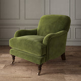 Green eco velvet upholstery fabric on an armchair