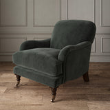 Green eco velvet upholstery fabric on an armchair